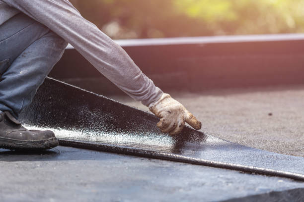 Professional Basement Waterproofing technician working in Kingston, NJ